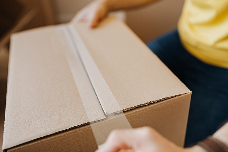 Taping carton box with armed tape