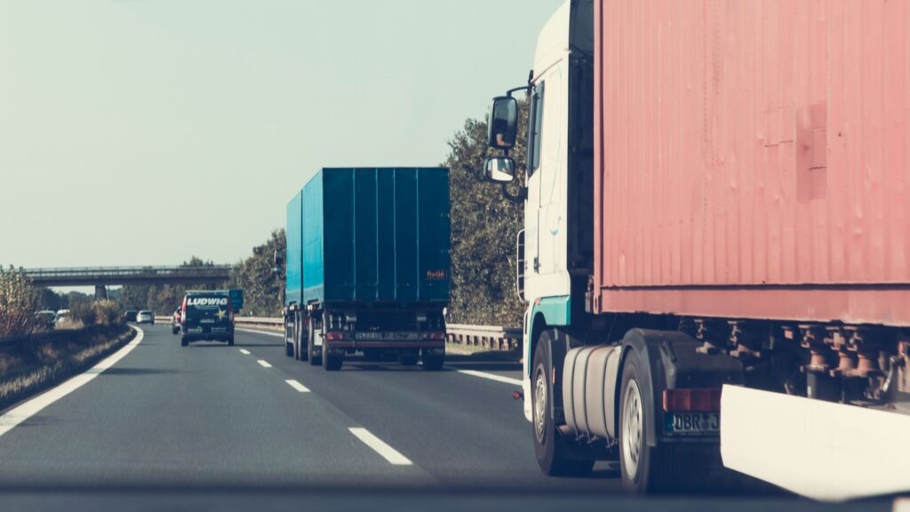 Two trucks on the highway