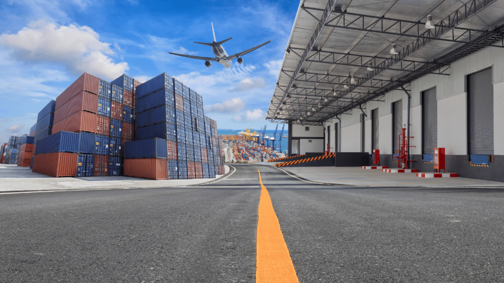 Airplane flying over shipping containers – MyDello's USA-Sweden Logistics Route