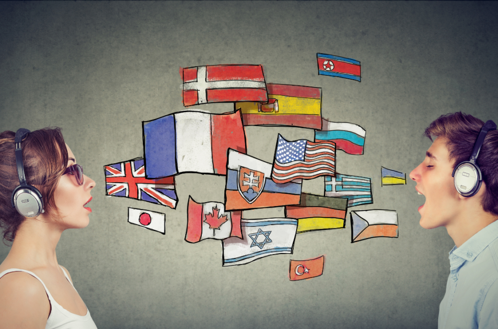 Two individuals with headphones conversing, with a backdrop of various country flags on a blackboard.